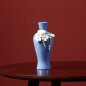 Blue handmade ceramic vase with flowers