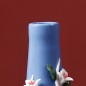 Blue handmade ceramic vase with flower