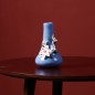 Blue handmade ceramic vase with flower