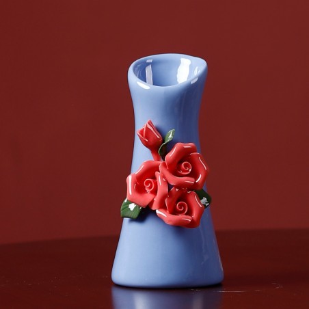 Blue handmade ceramic vase with roses