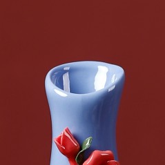 Blue handmade ceramic vase with roses