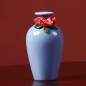 Blue handmade ceramic vase with rose