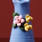 Blue handmade ceramic vase with flowers