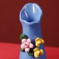 Blue handmade ceramic vase with flowers